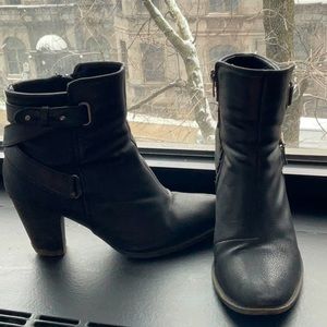 Used black booties with straps. Size 8.5
